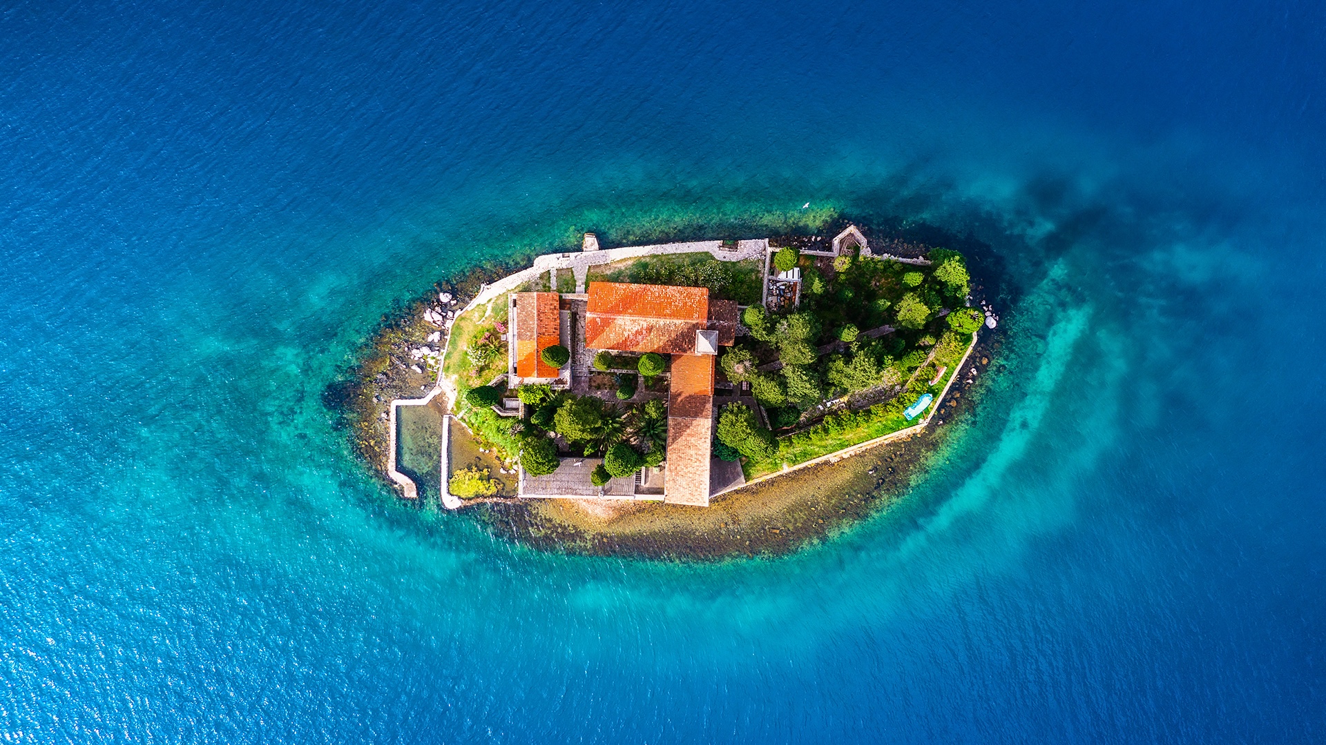 Overhead view of a small private island with developed structures