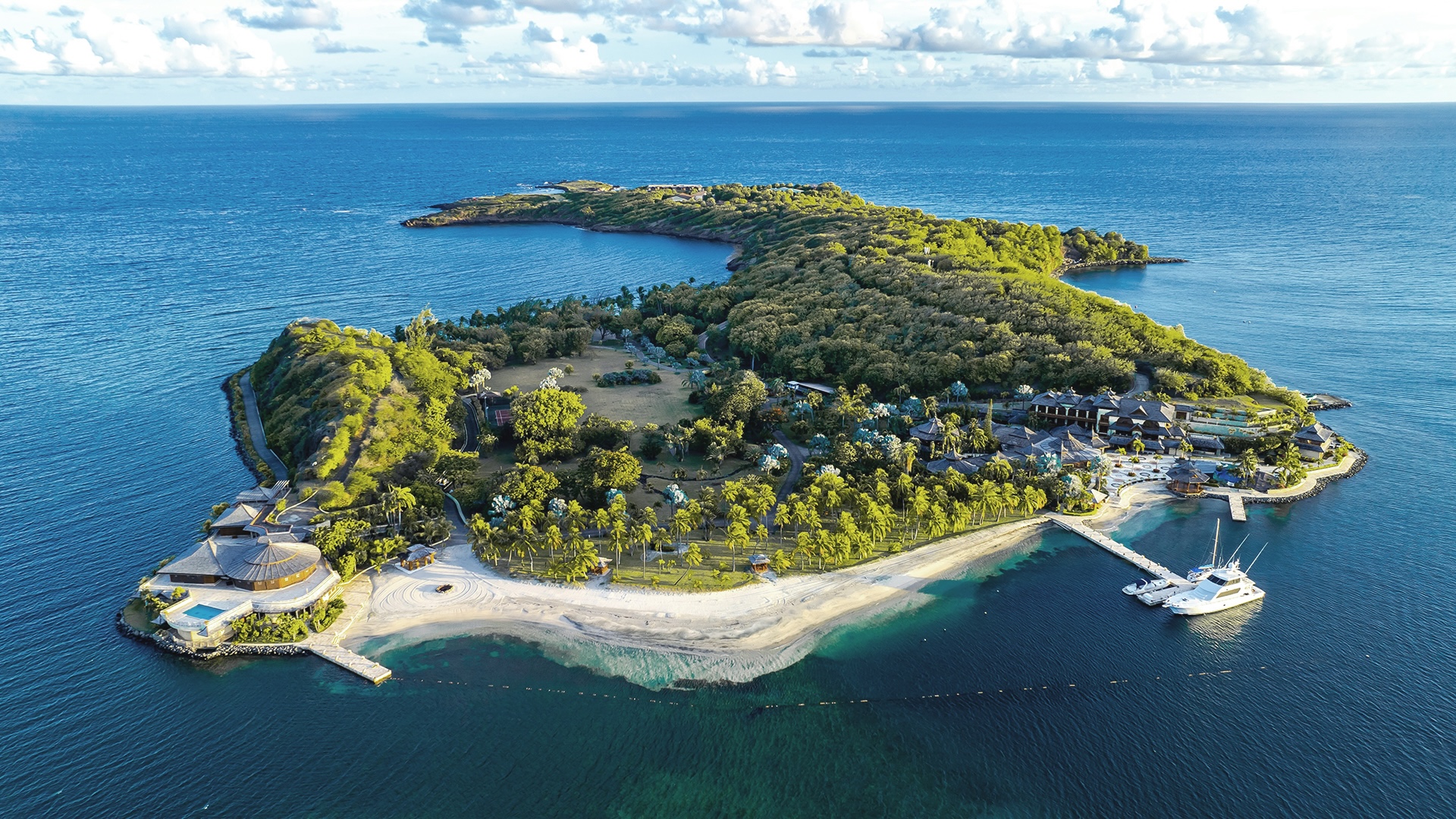 Drone view of a private island with tourism infrastructure