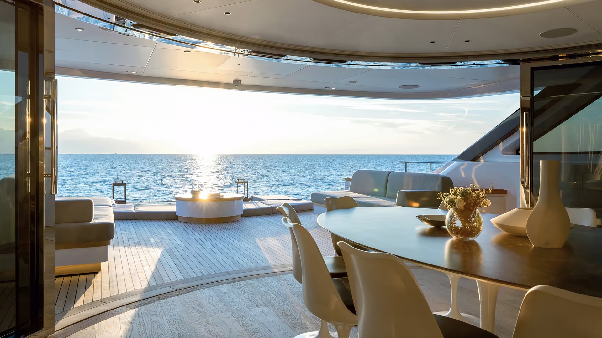 View of the aft deck of the Benetti Oasis 34M from the fully open salon