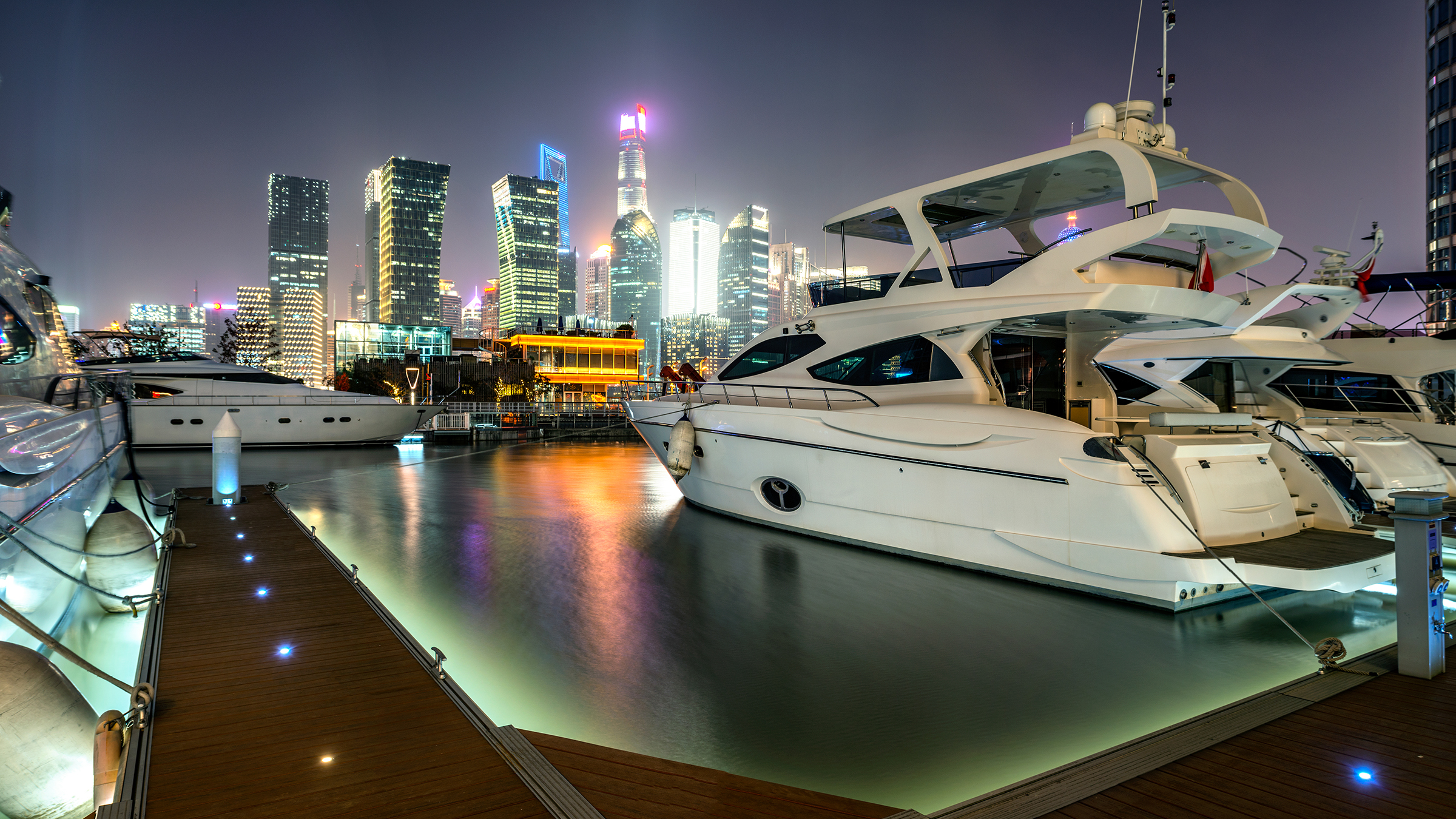 Profile of a yacht moored stern-to in a marina