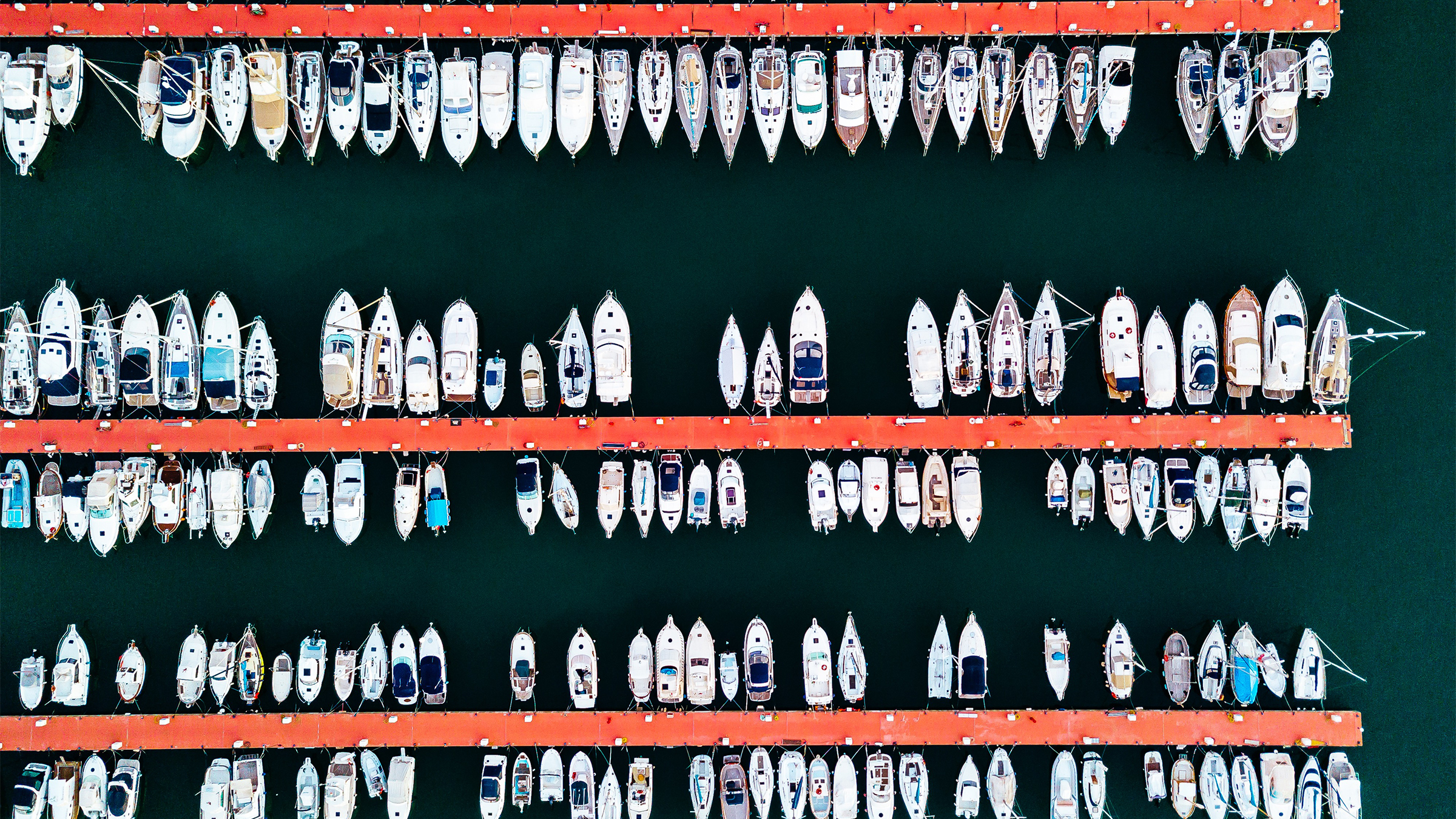 Drone view of yachts moored in a large marina