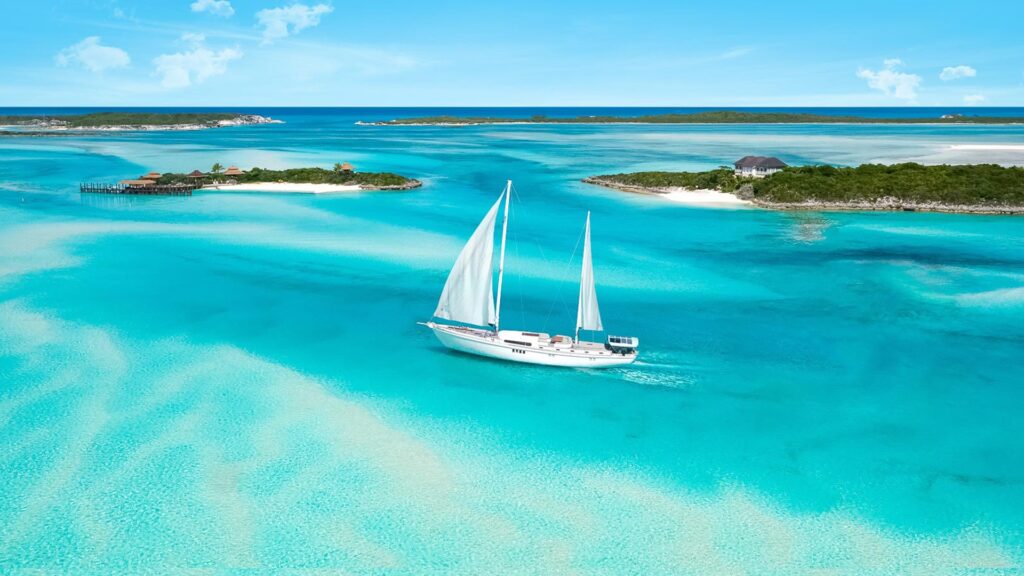 4 Big Sailboat sailing in the midle of the islands Aerial