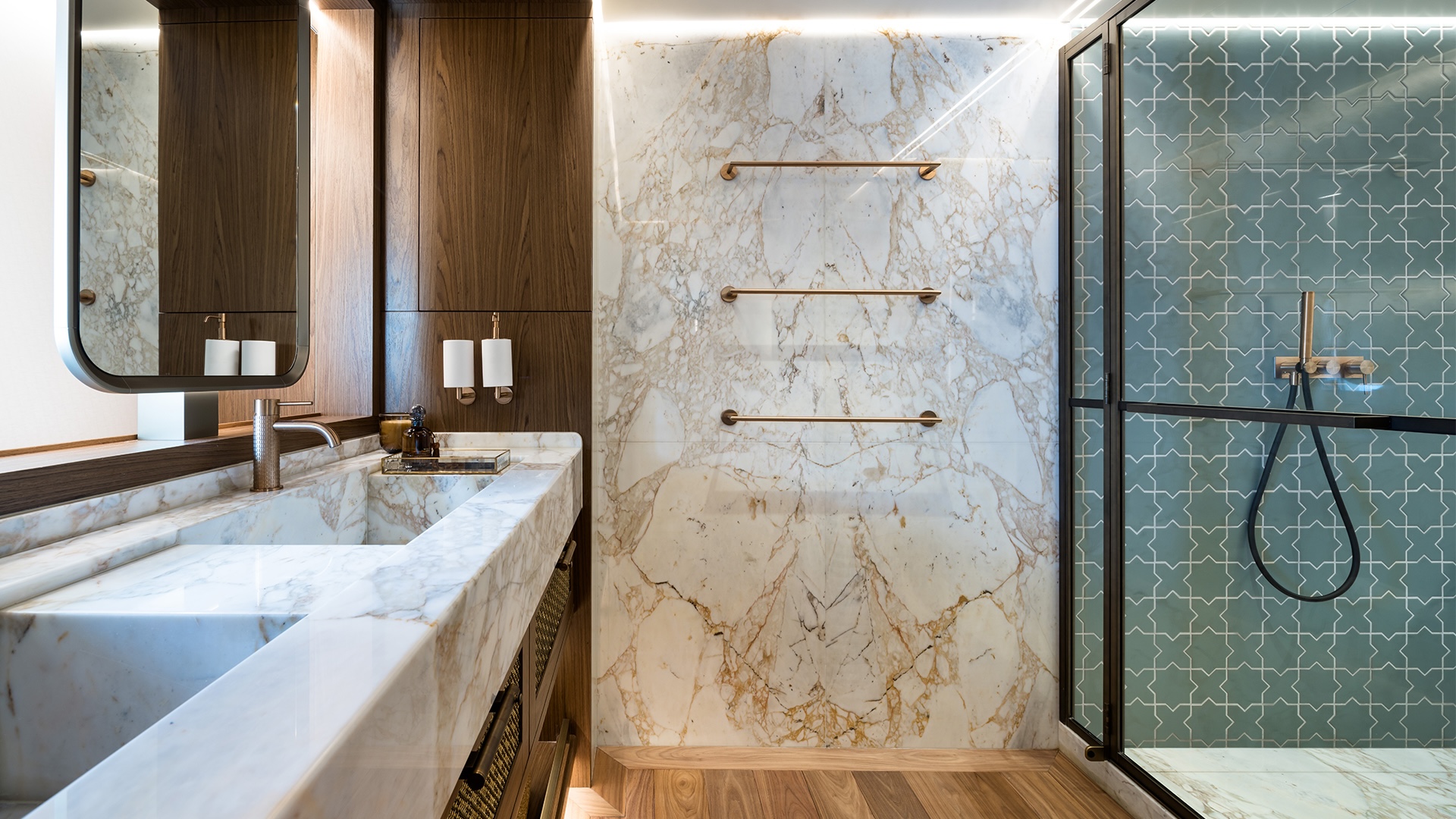 Owner's bathroom on Simena with Turkish stone in greys, lavenders and brass-veined marbling