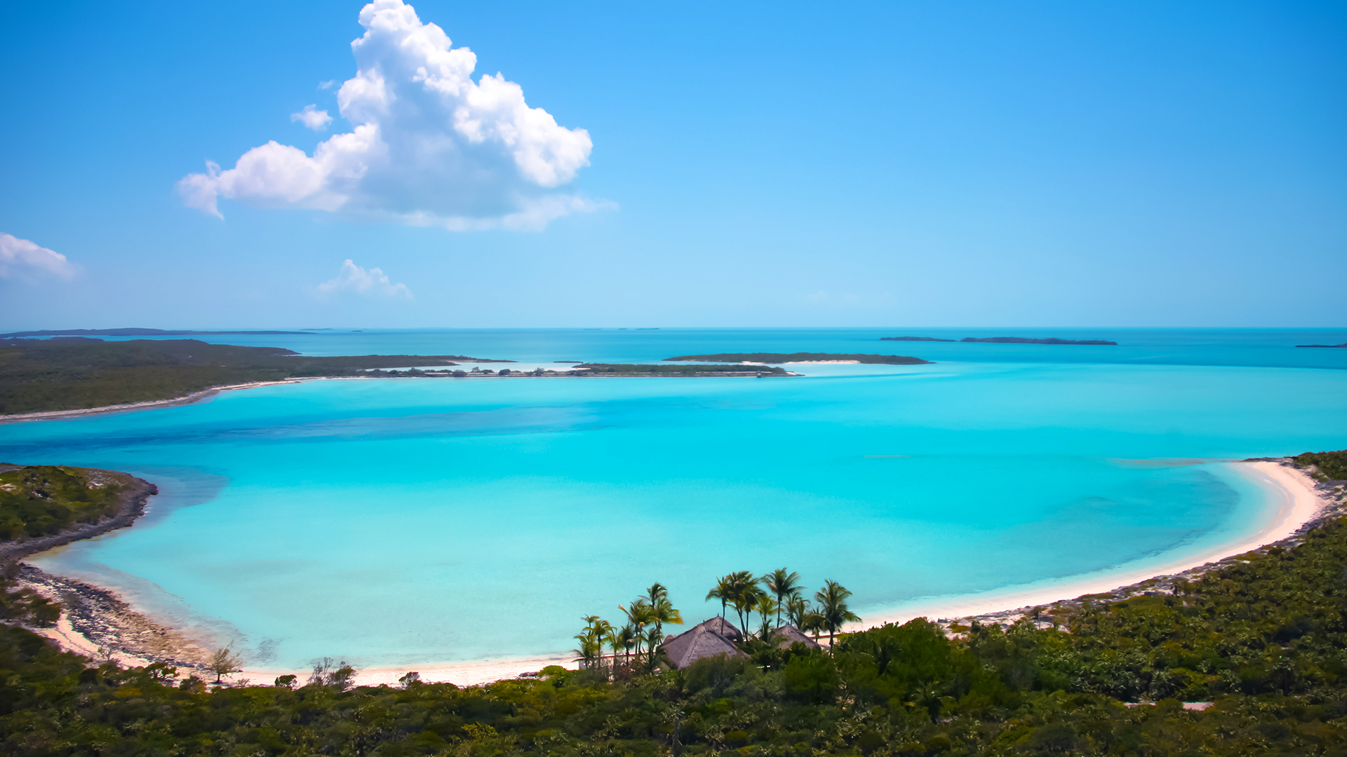 Vista aérea de una residencia frente al mar en Musha Cay