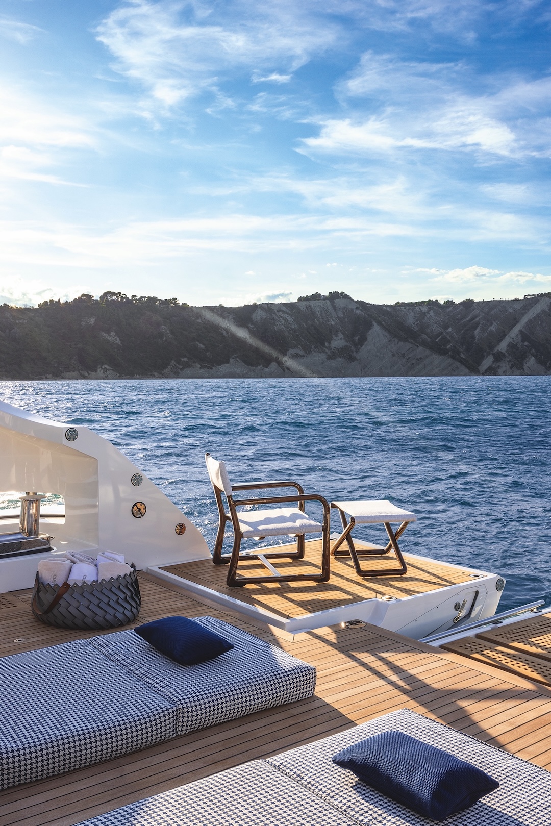 Custom Line 50 reading chair on aft swim platform
