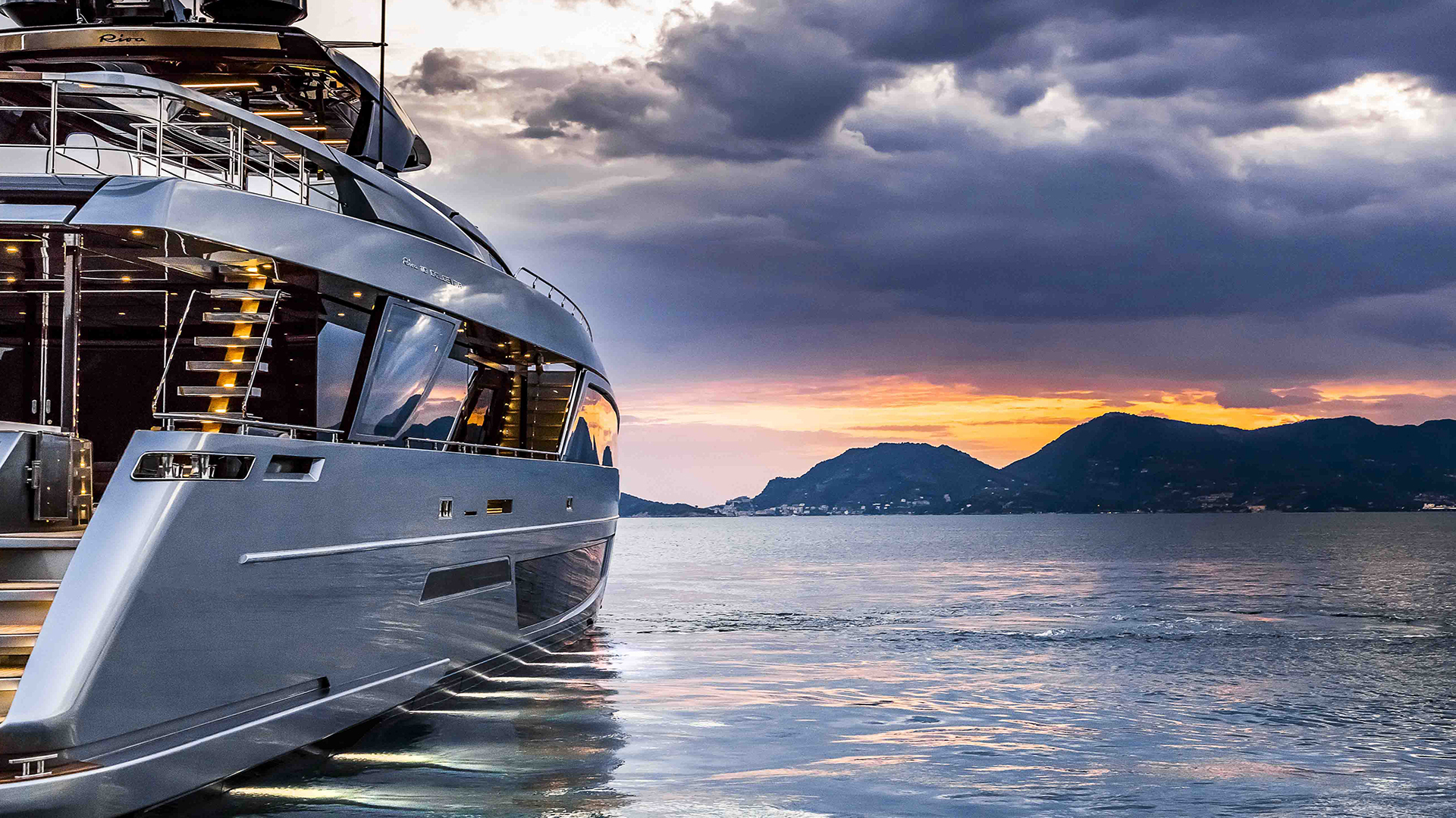 Riva 112 stern profile at sunset