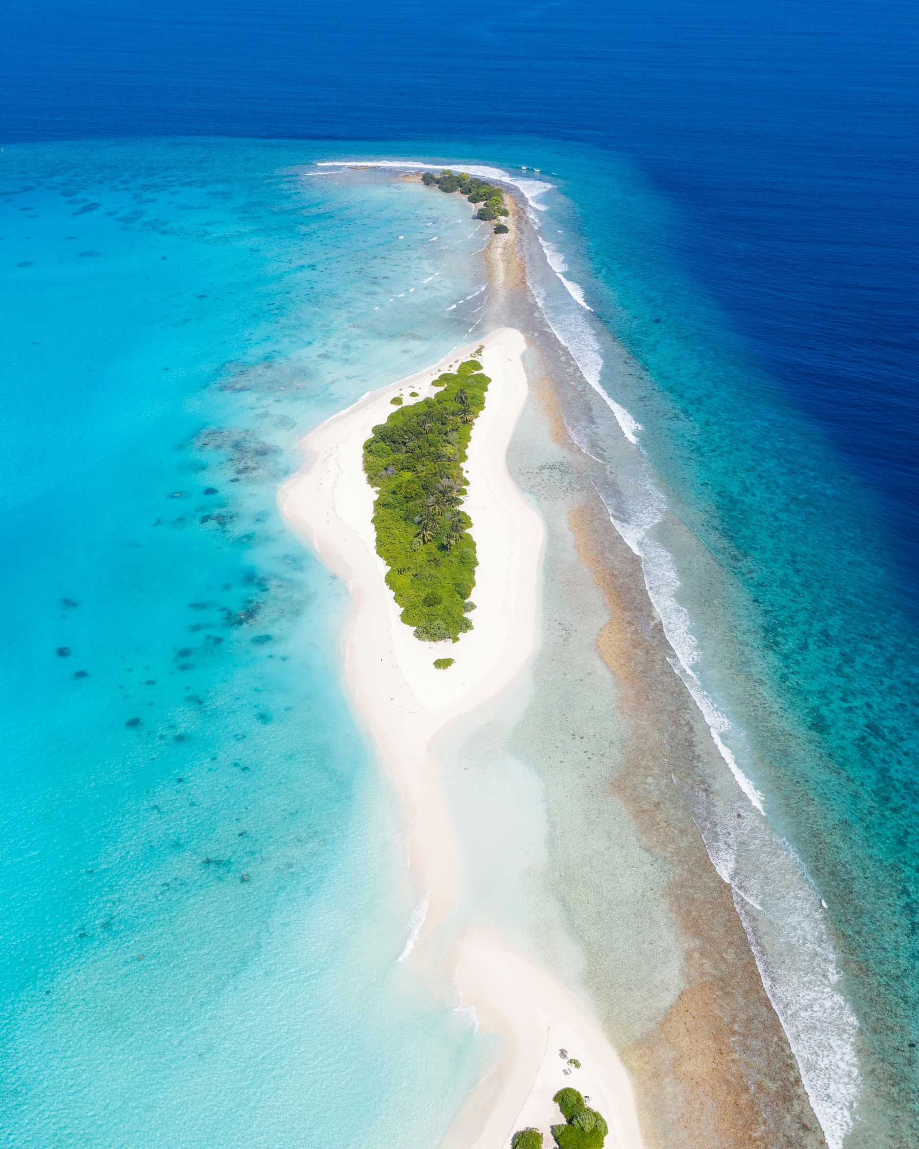 Aerial view of a long, narrow private island