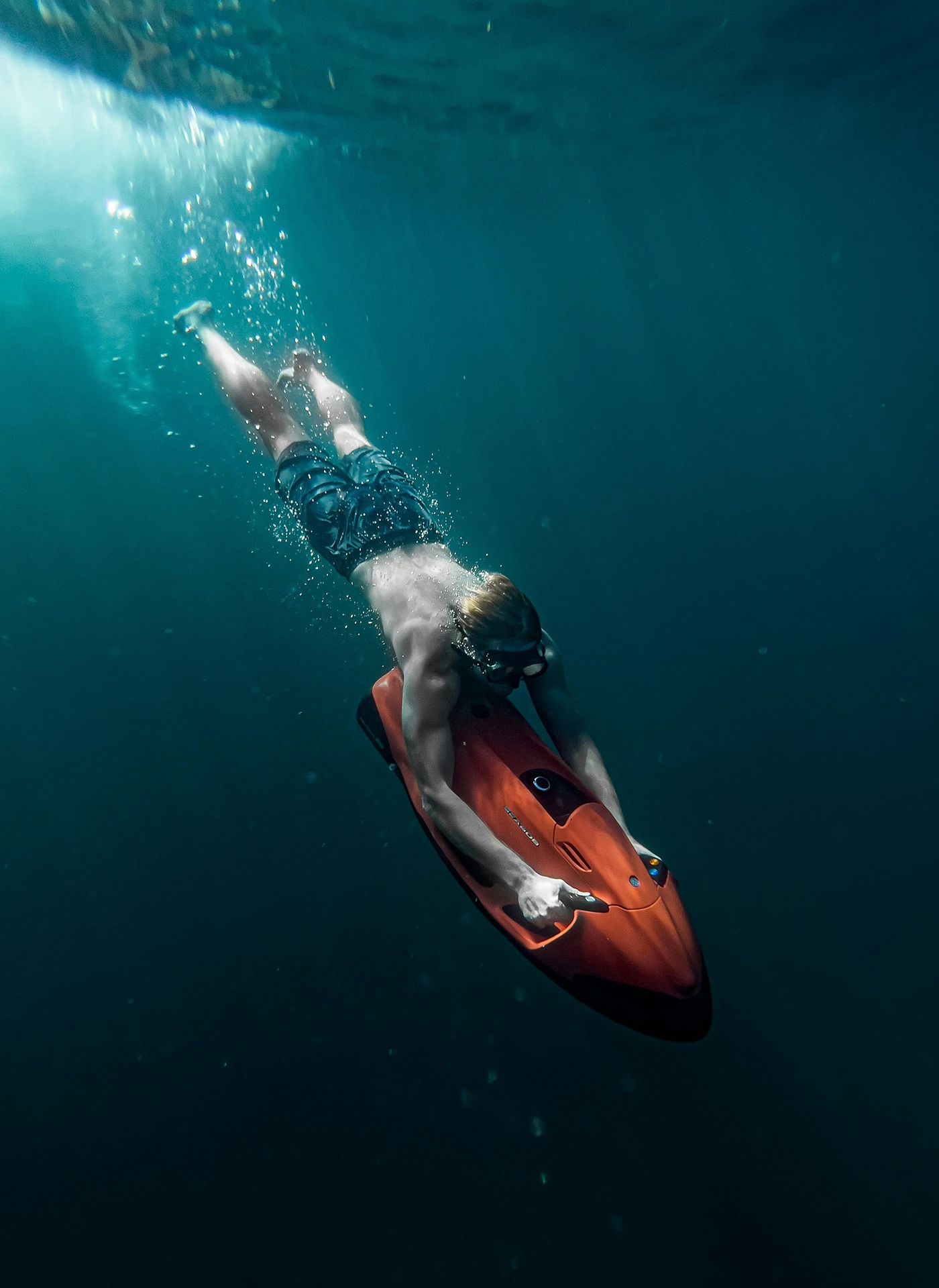 A young diver descending with a seabob