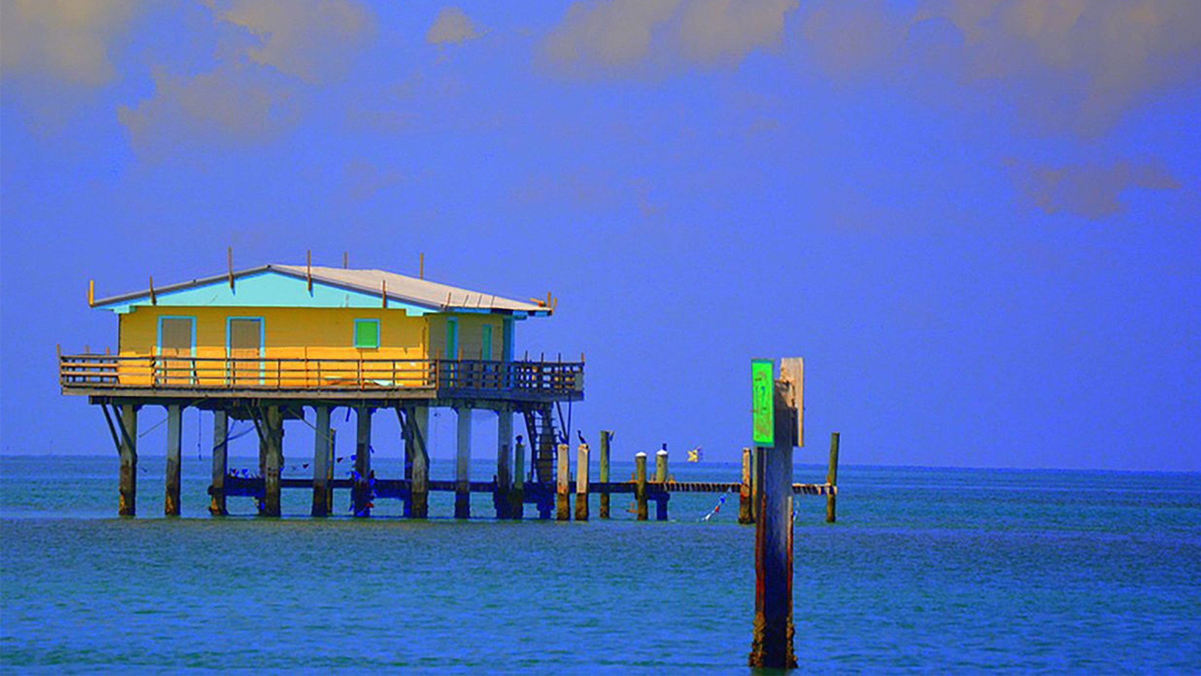 Stiltsville houses standing in the water off Miami