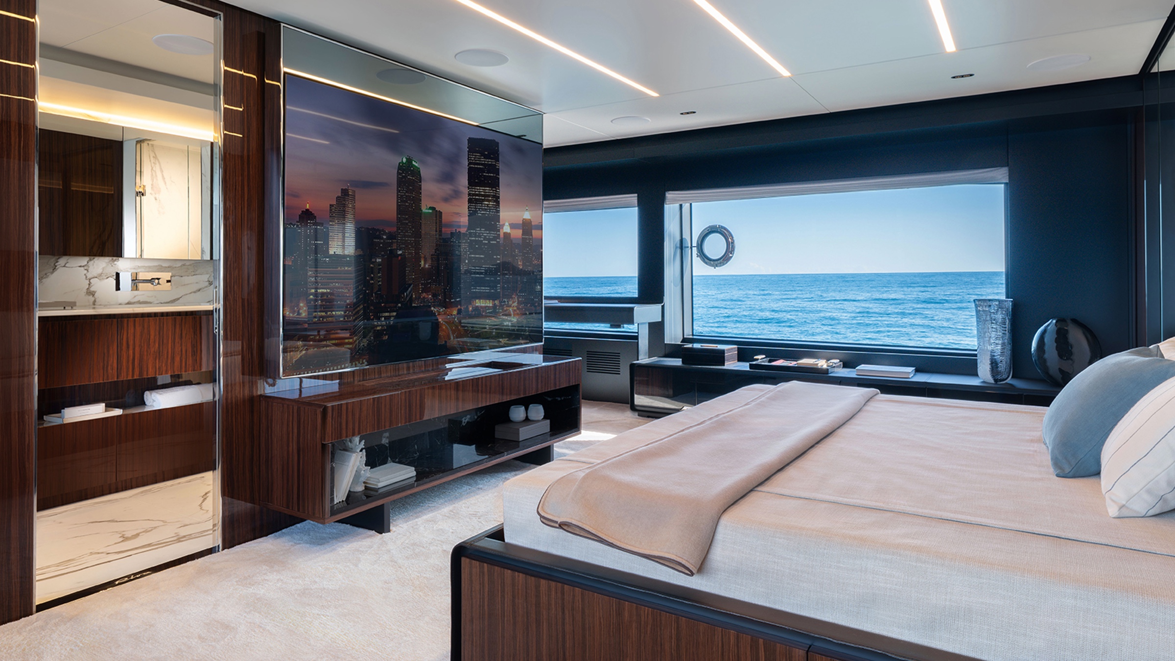 A large window in the main suite looking out to the water