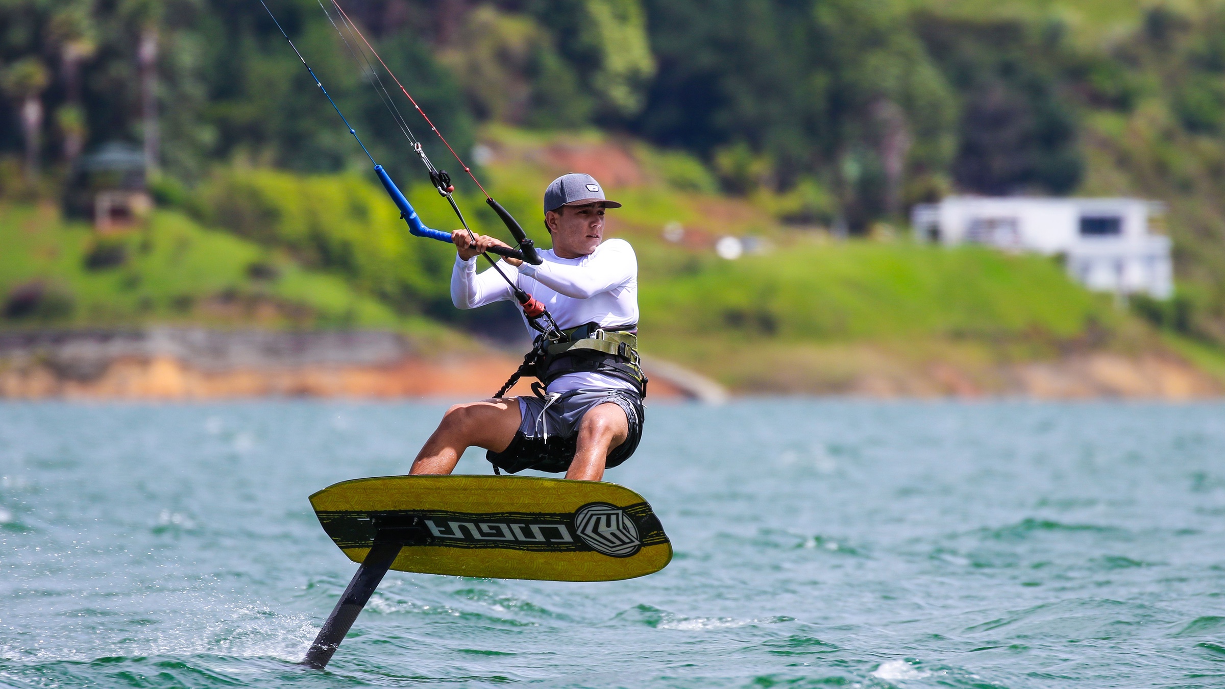 Young rider on a hyperfoil pulling a kite