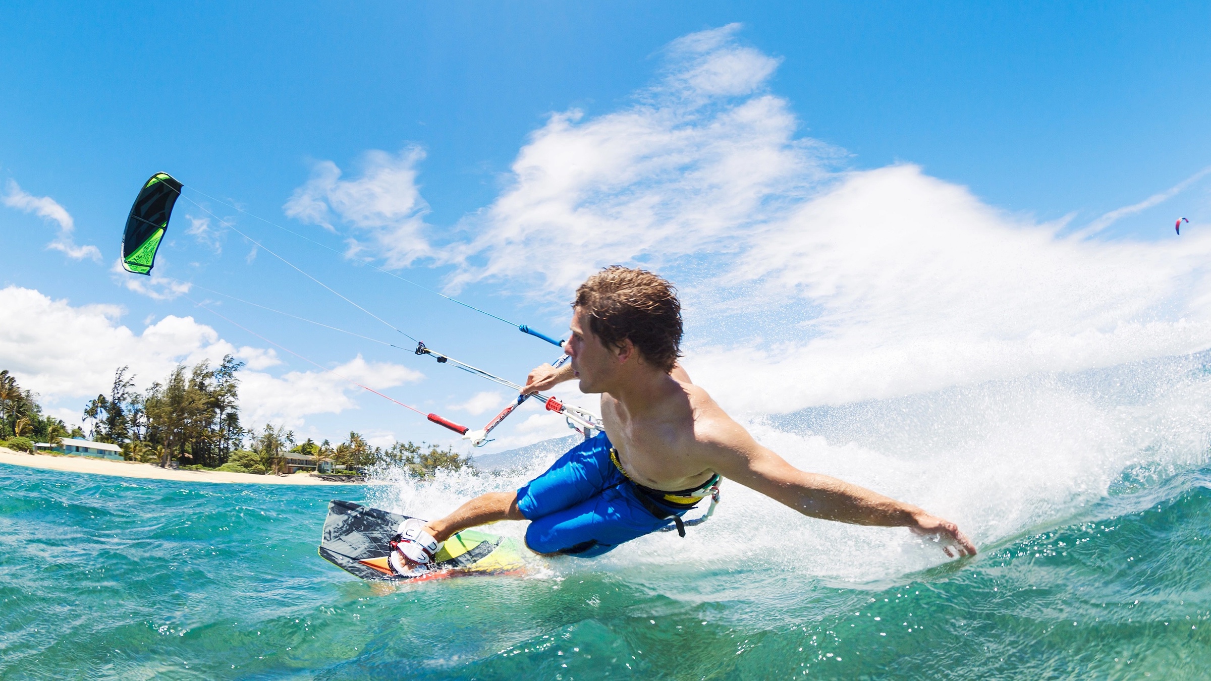 Young person kitesurfing