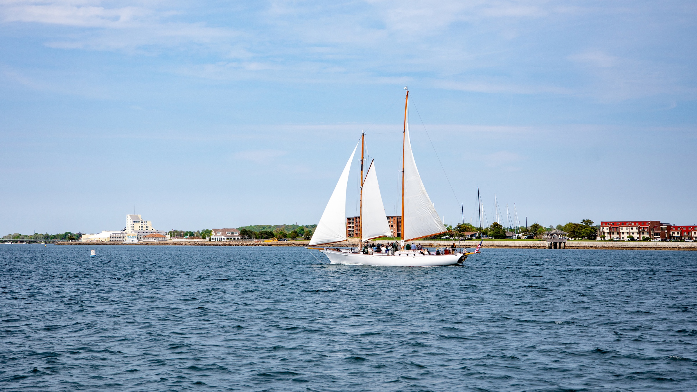 A classic sailboat sailing in Newport