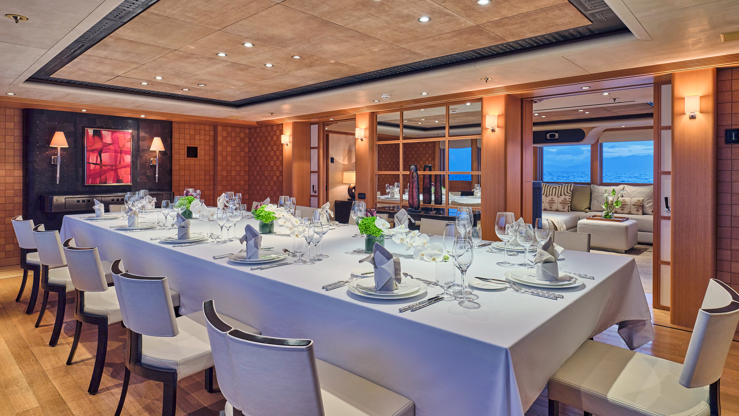Dinner table set for twelve aboard