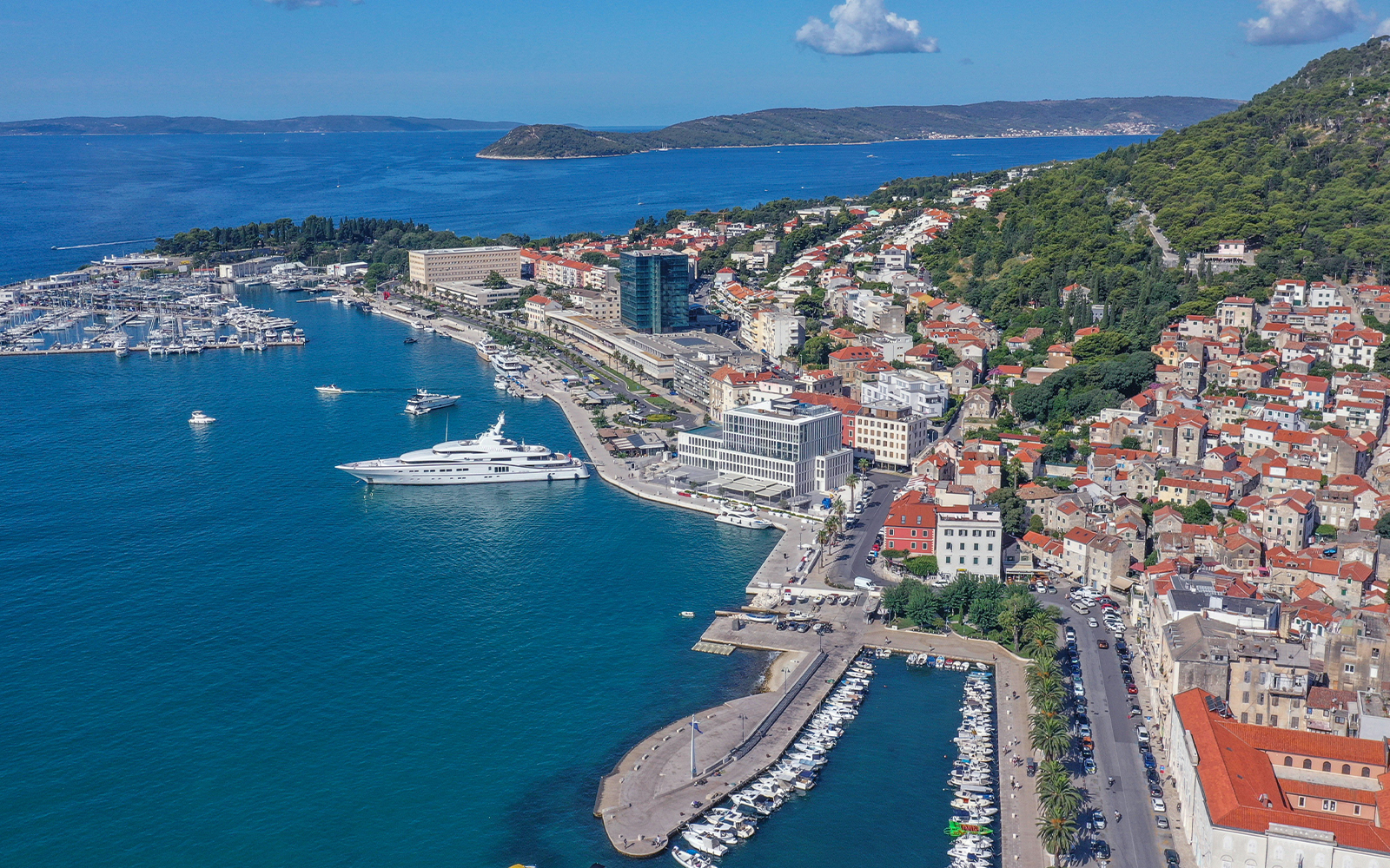 Aerial view of Split harbour with a superyacht stern-to